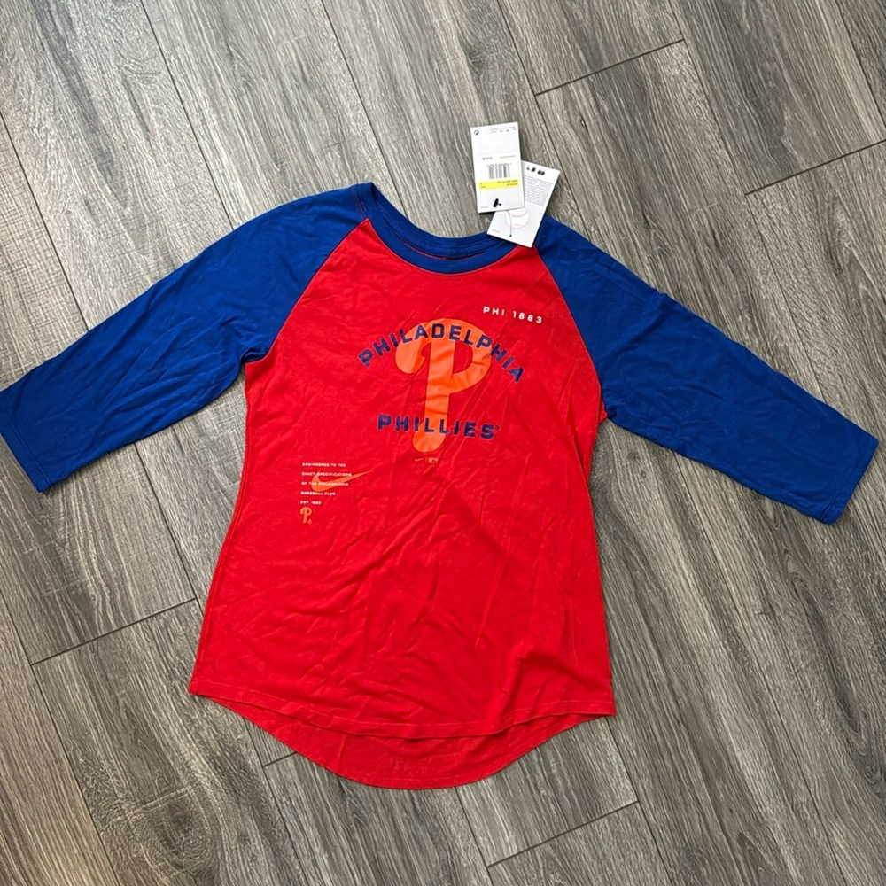 Long sleeve Phillies shirt. Never worn, tag still on it.